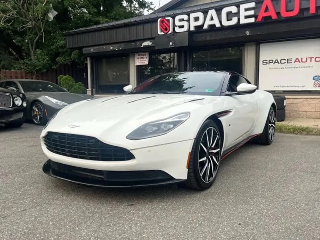 Aston Martin DB11 front three-quarter view, phone photo before CarShots