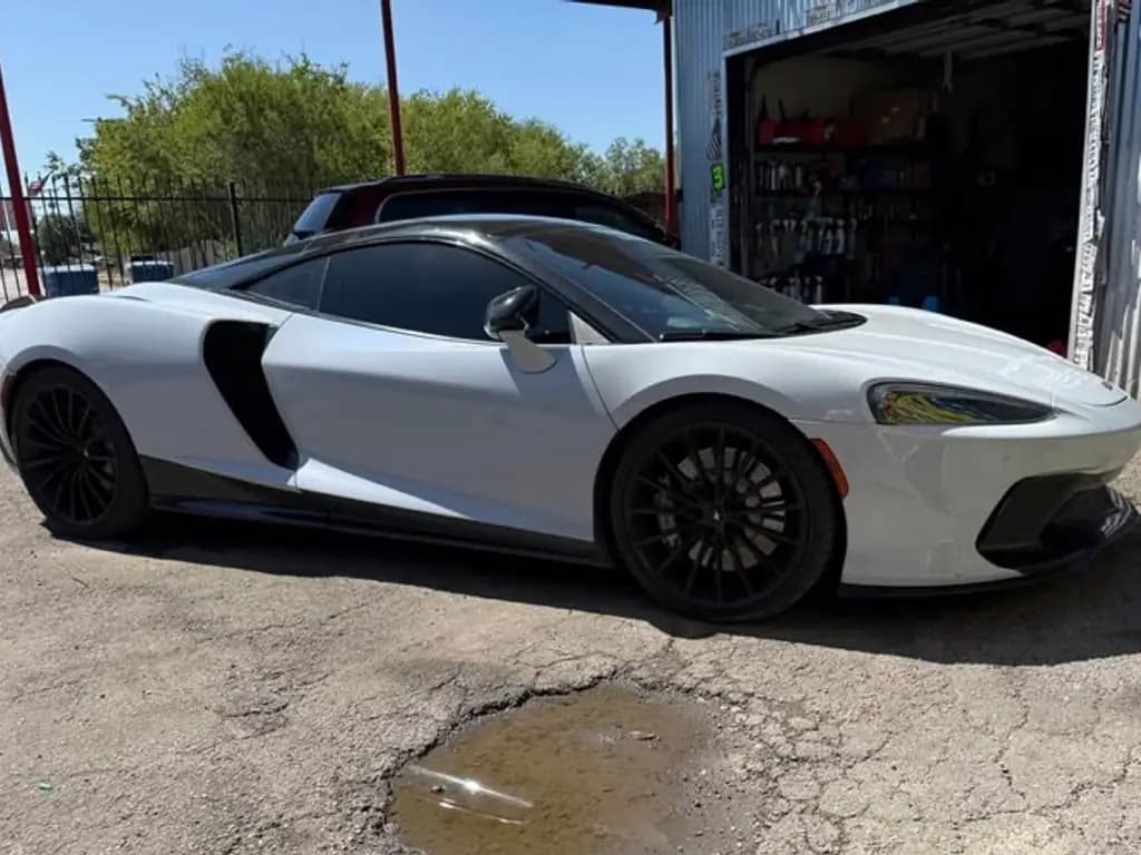 McLaren GT front three-quarter view, phone photo before CarShots