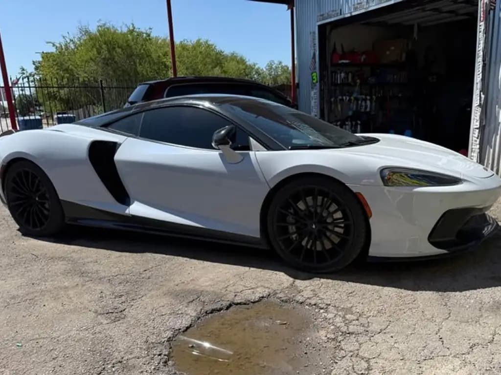 McLaren GT front three-quarter view, phone photo before CarShots