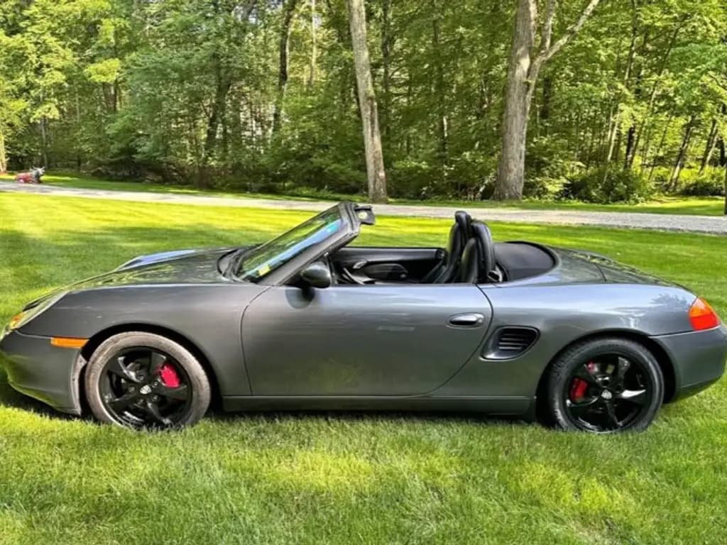 Porsche Boxster side view, phone photo before CarShots