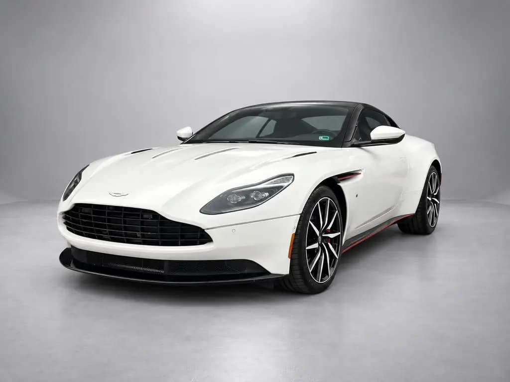Aston Martin DB11 front three-quarter view, after CarShots Gray Studio background