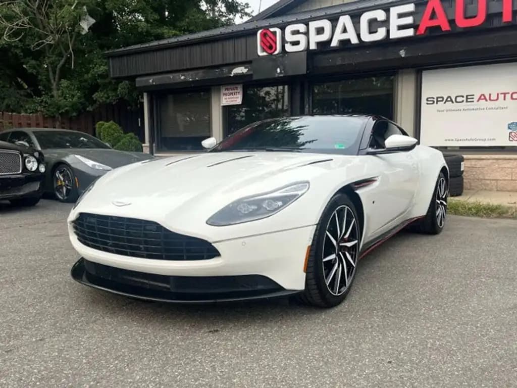 Aston Martin DB11 front three-quarter view, phone photo before CarShots